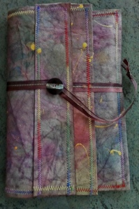 Folder for loose-leaf journal pages. Monsoon papers, stitched.